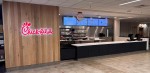 Photo of the counter and register area of a Chick-fil-A restaurant. thumb