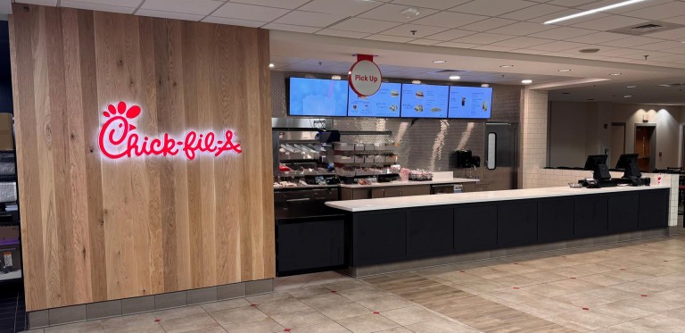 Photo of the counter and register area of a Chick-fil-A restaurant.