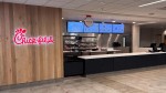 Photo of the counter and register area of a Chick-fil-A restaurant. thumb